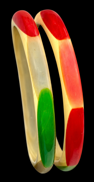 Shultz cream narrow bakelite bangles with rainbow colors of oval dots